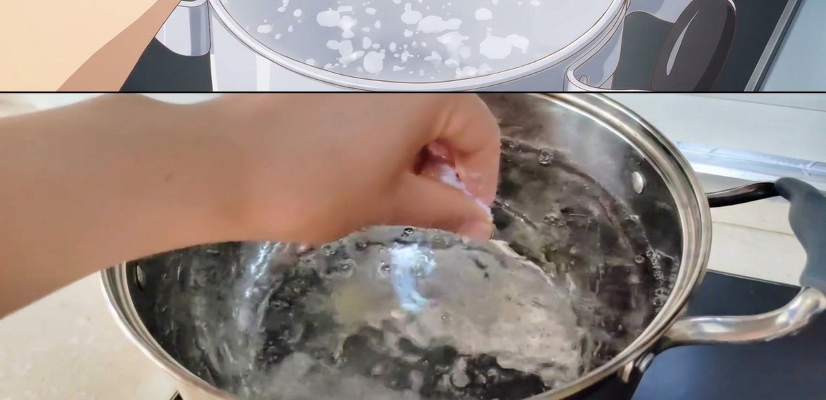 Una mano añadiendo una pizca de sal a una olla de agua hirviendo.