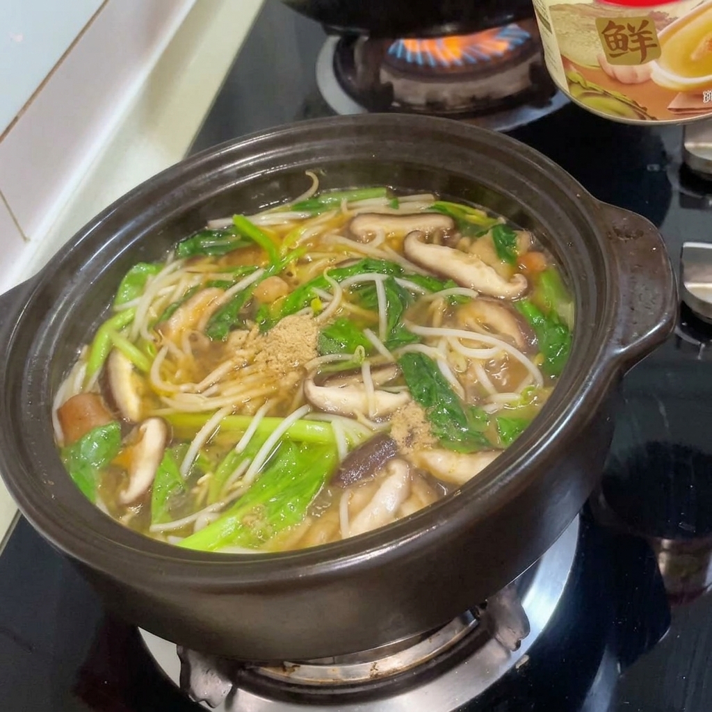 Sazonador de carne en polvo espolvoreado sobre el estofado.